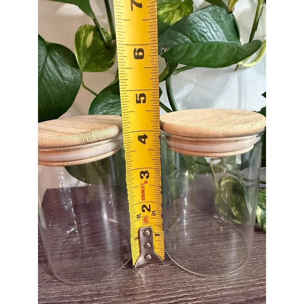 Two wooden sealed jars